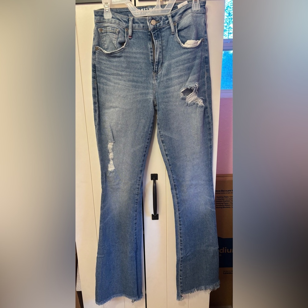Distressed Blue Jeans